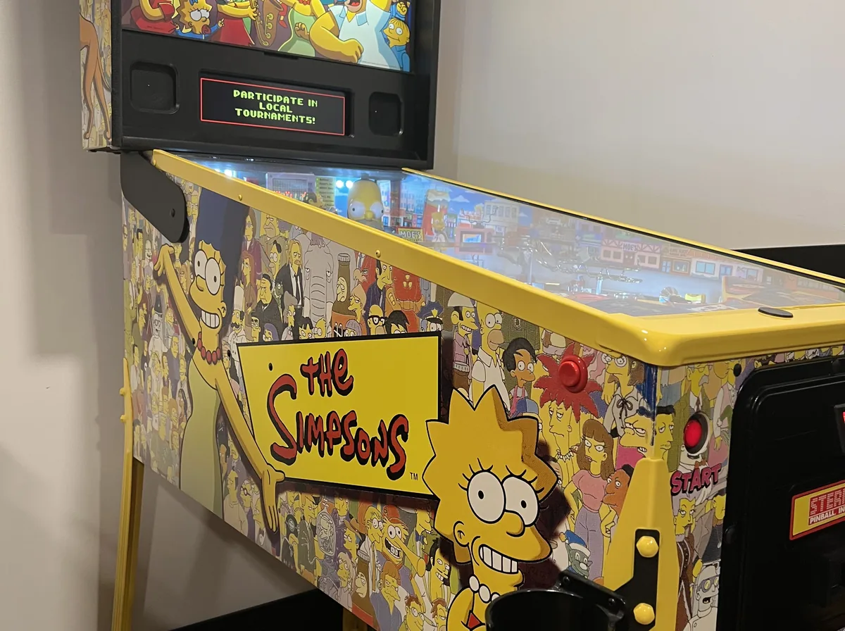 Pinball machine wheeled into an event hall